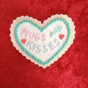 Heart-Shaped "Hugs And Kisses" Magnet